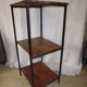 Extended workshop column on metal and wood stand