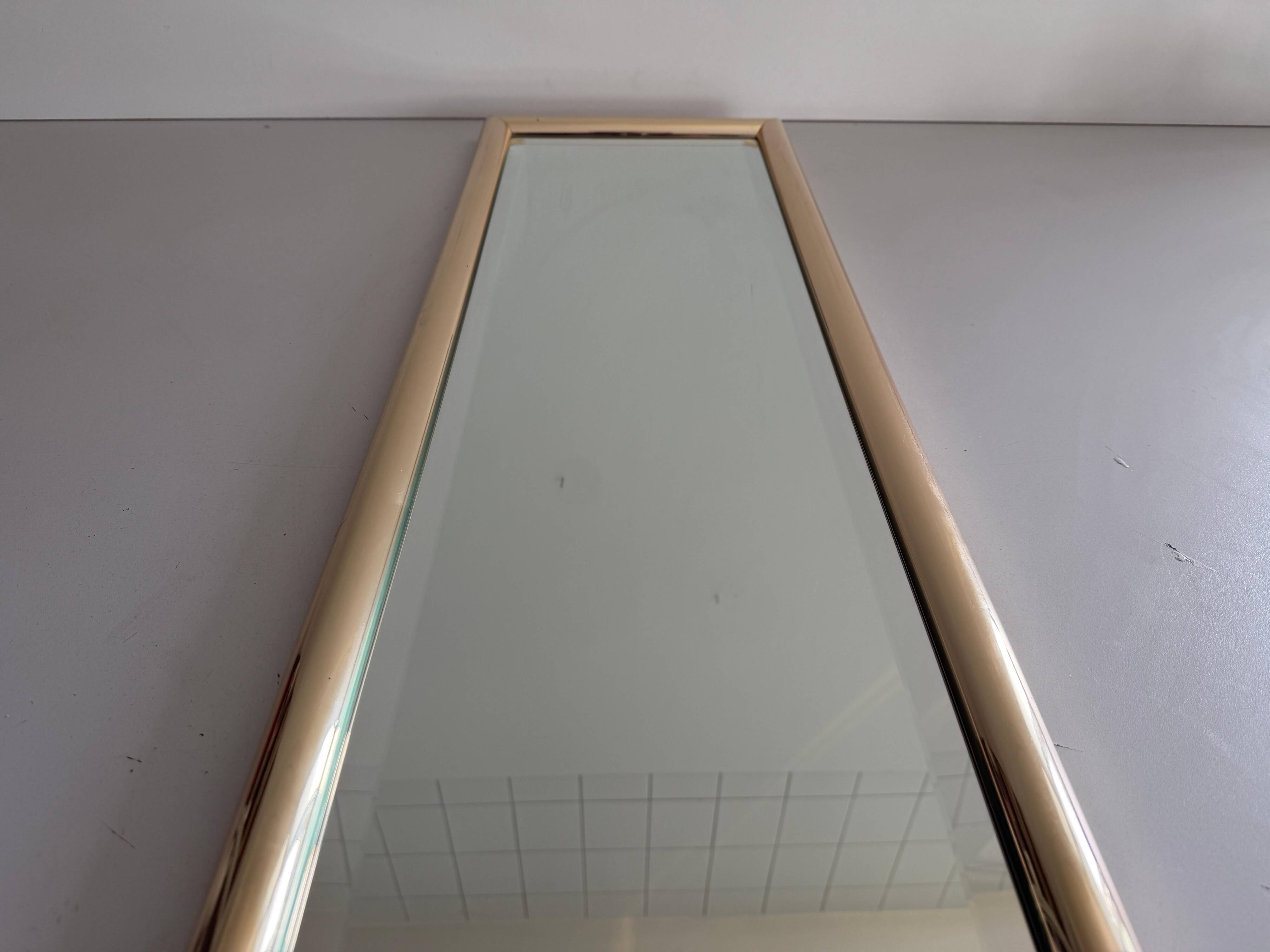 Rectangular wall mirror with a gold metal frame by Schöninger, 1970s, Germany.
