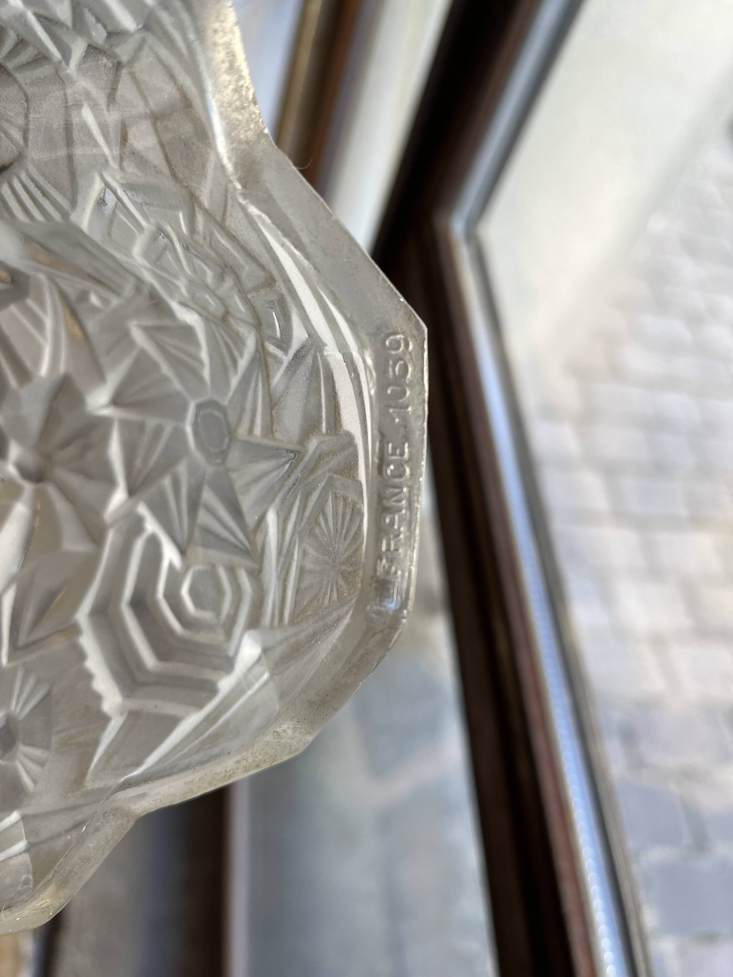 Signed art deco wall light