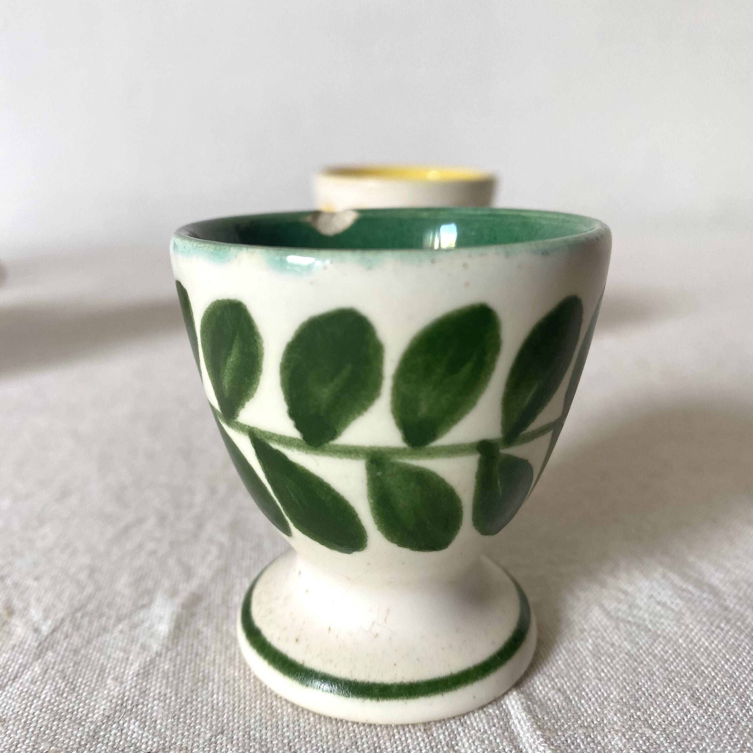 Antique earthenware egg cups