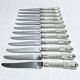 MARTIAL GAUTHIER / GEORGES FLAKENBERG - 12 KNIVES WITH SILVER HANDLES