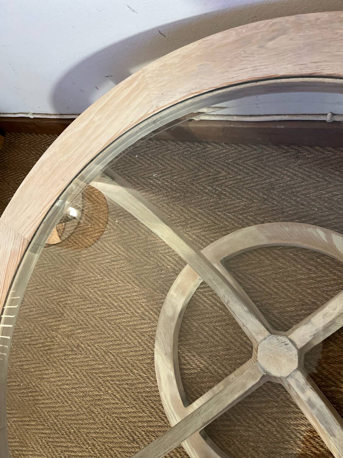 Oval patinated wood and beveled glass coffee table