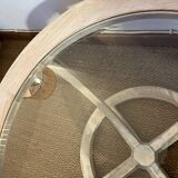 Oval patinated wood and beveled glass coffee table