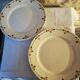 Six flat plates in faince Badonviller stylized flowers ochre and green