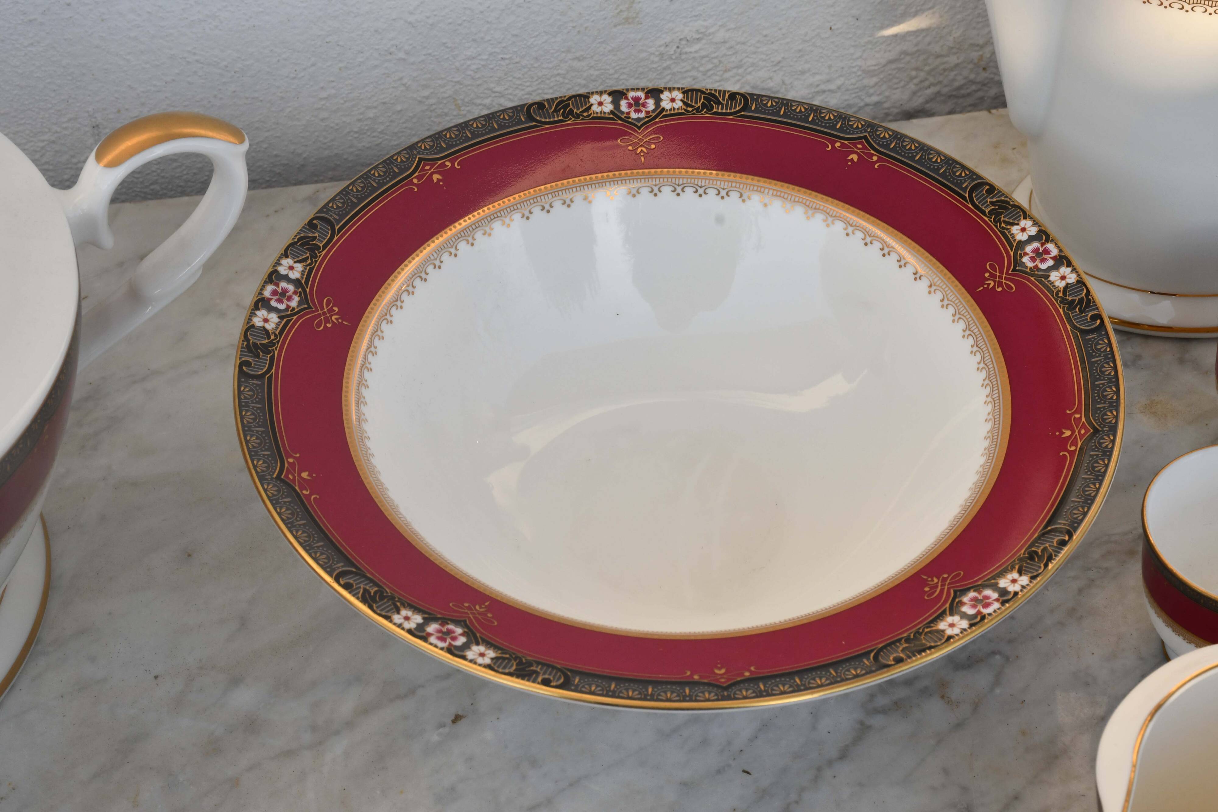 Elegant mid-century Japanese bone china service for 12 in white and noble red