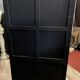 20th century China: Pretty bookcase in lacquer, hard stone and mother-of-pearl with three glazed sides