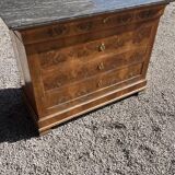Antique chest of drawers with a grey marble top.