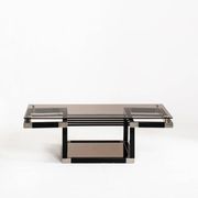 Coffee table attributed to Romeo Rega. Iron and smoked glass – France, 1980s.