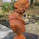 Cast iron bust of a 19th century roman woman