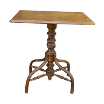 Curved wooden pedestal table 1900