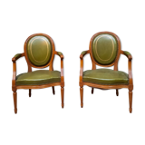 Pair of Louis XVI style leather armchairs