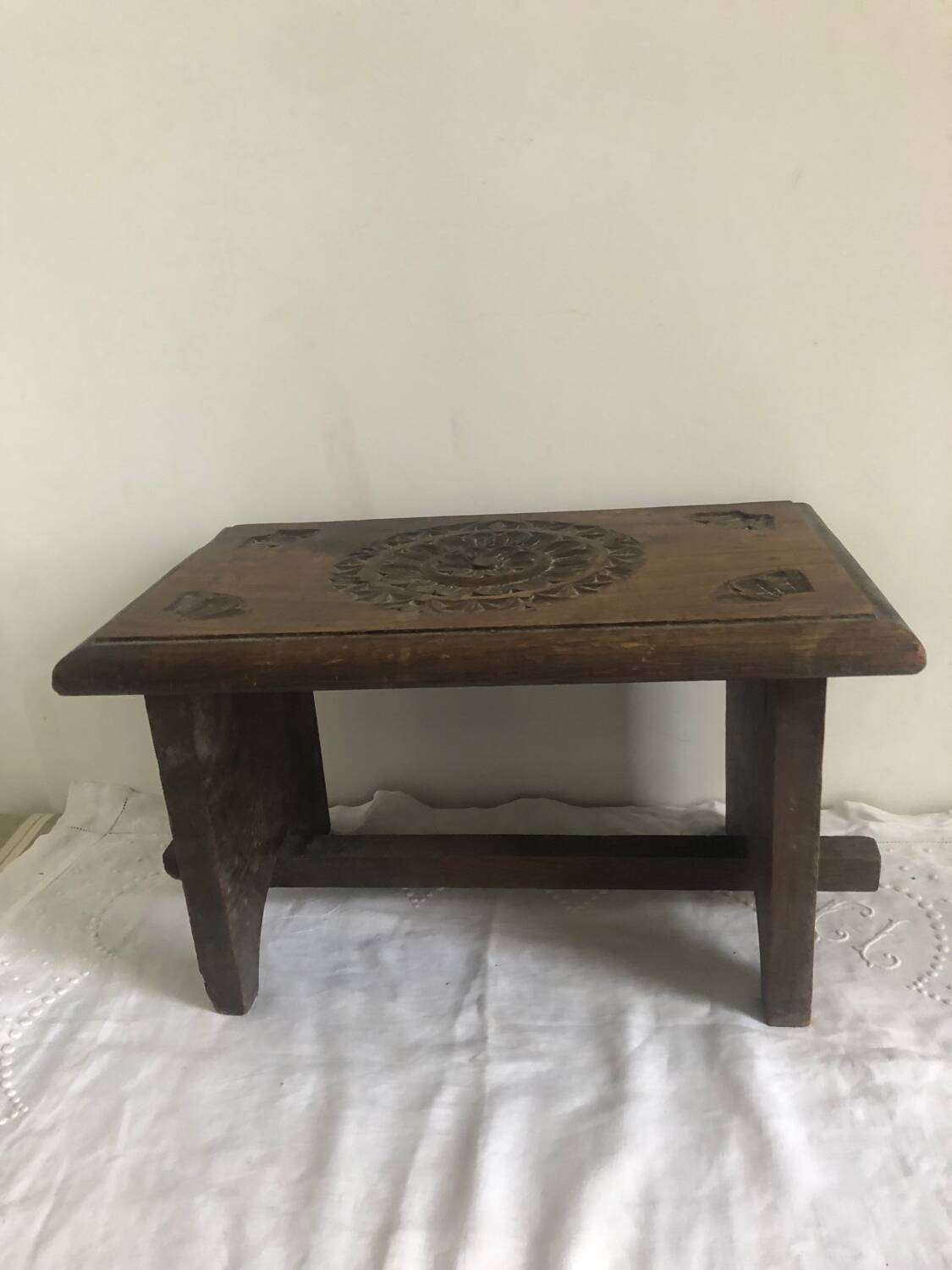 Old small hand-carved bench