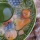 Antique cup and saucer in slipware.