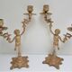Pair of vintage golden brass cherub candlesticks