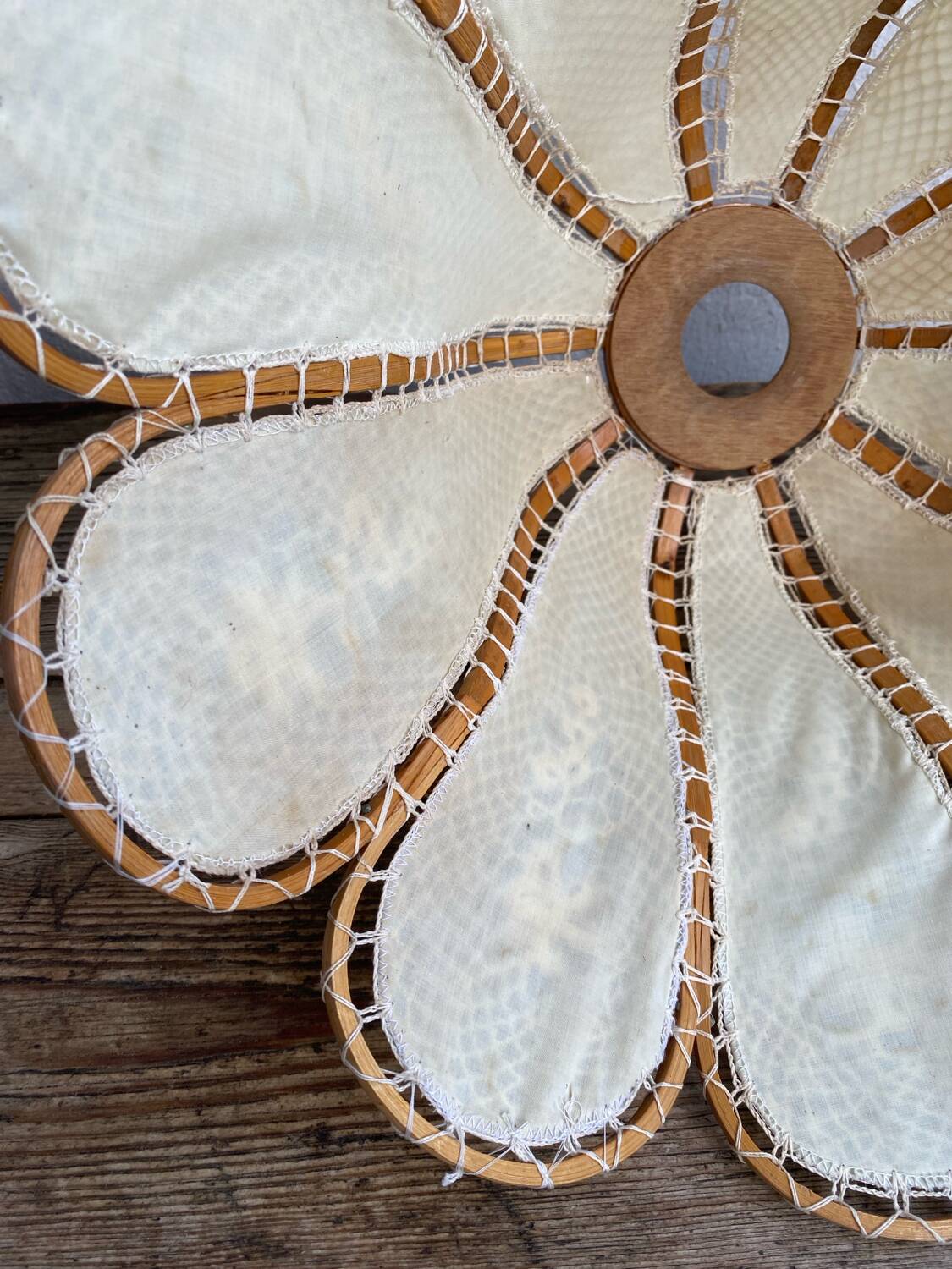 Hanging flower in wood, fabric and hook