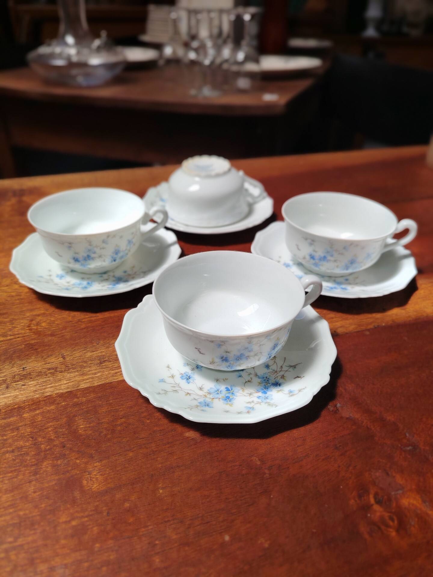 Set of 4 Limoges porcelain cups and saucers.