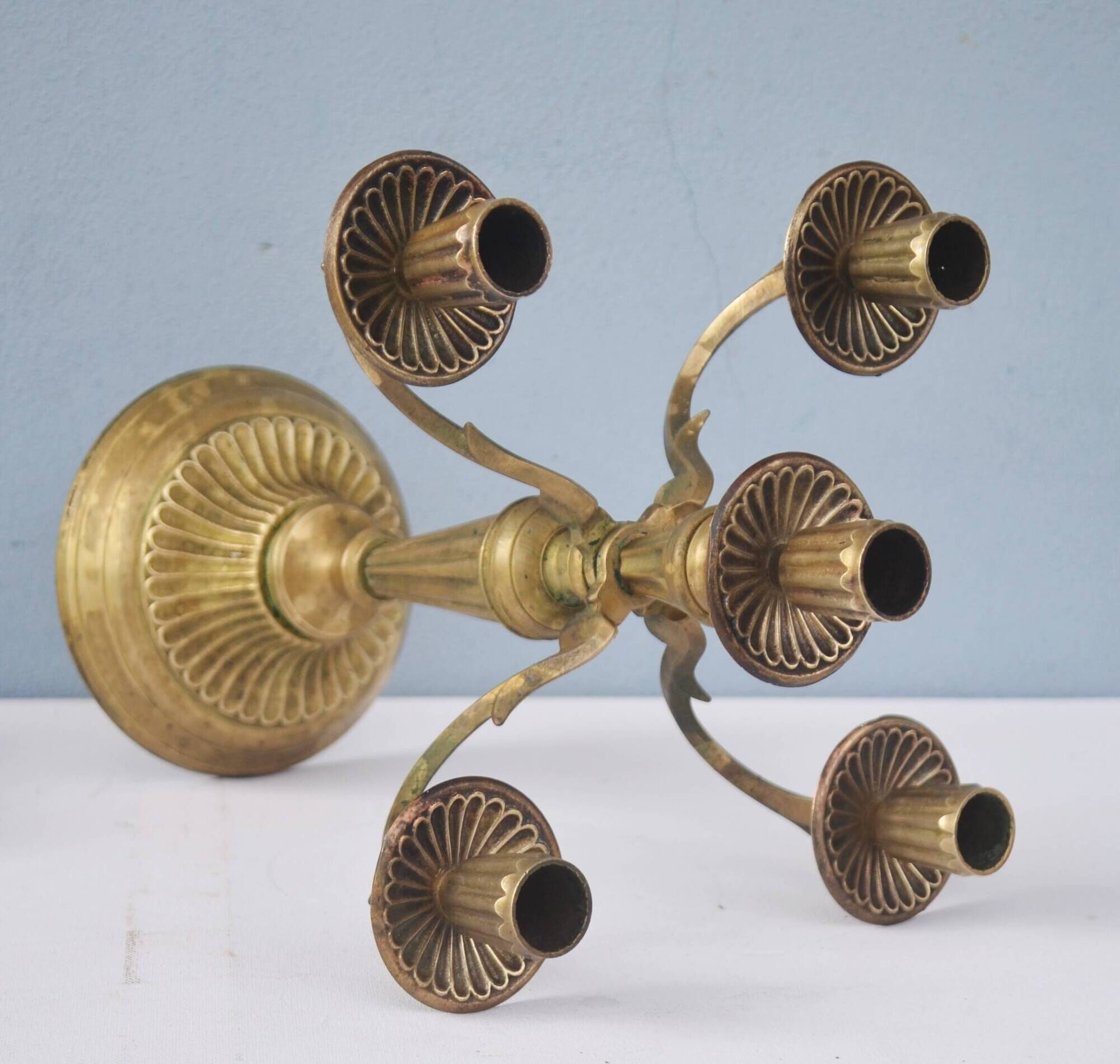 Solid brass candle holder with 5 candles and 4 arms