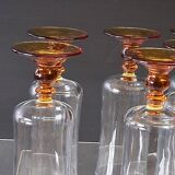 6 amber-footed champagne flutes in very good condition.