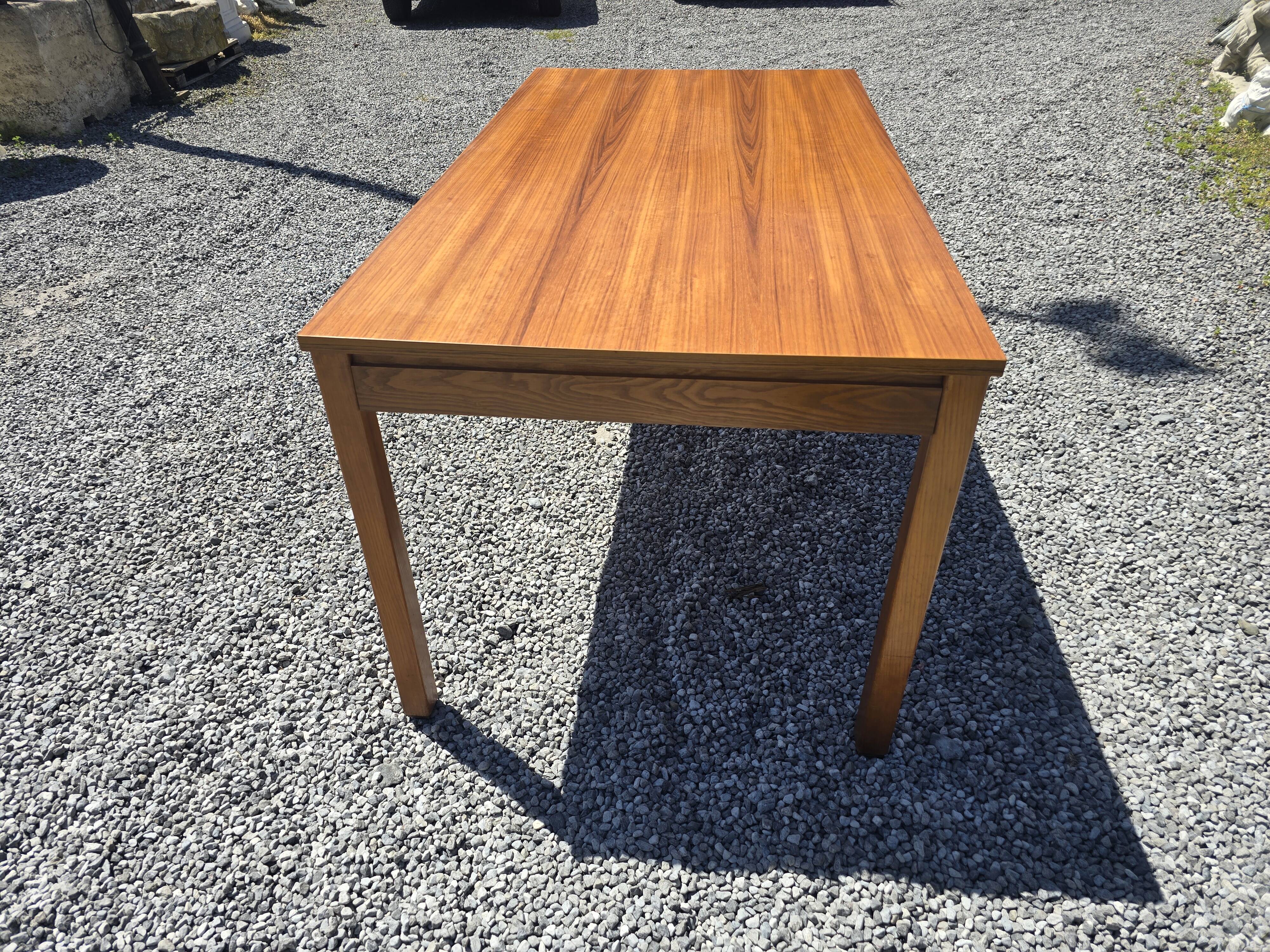 Scandinavian extendable teak table from the 60s