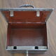Cashier, patinated safe with its key