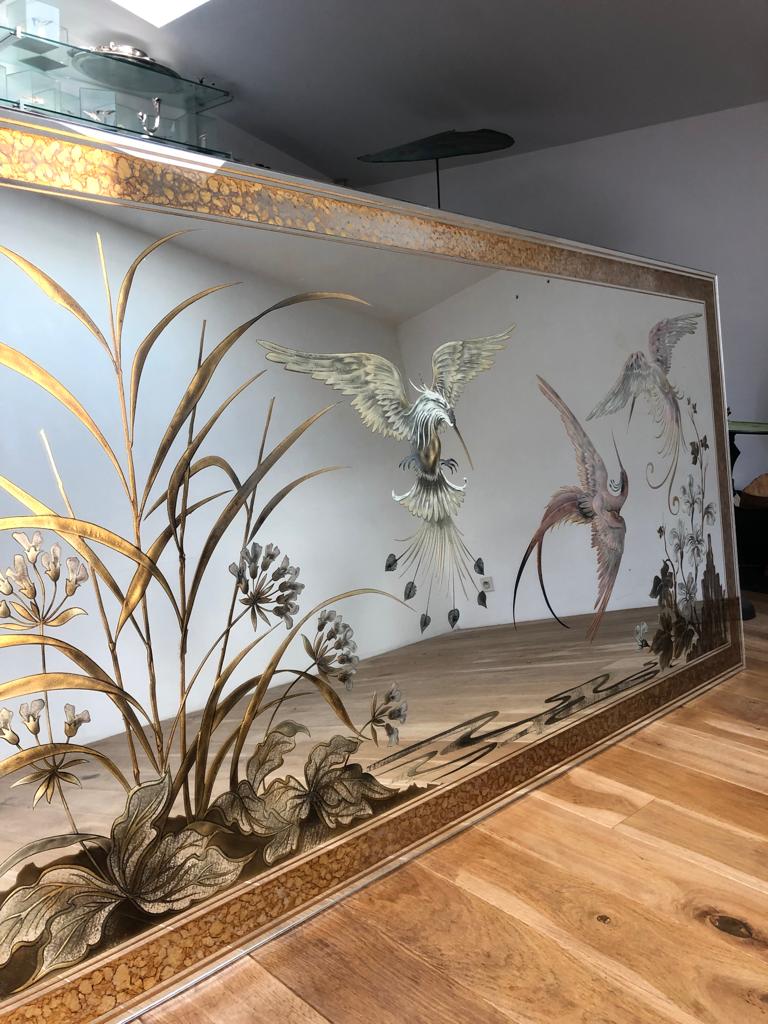 Mirror decorated with birds