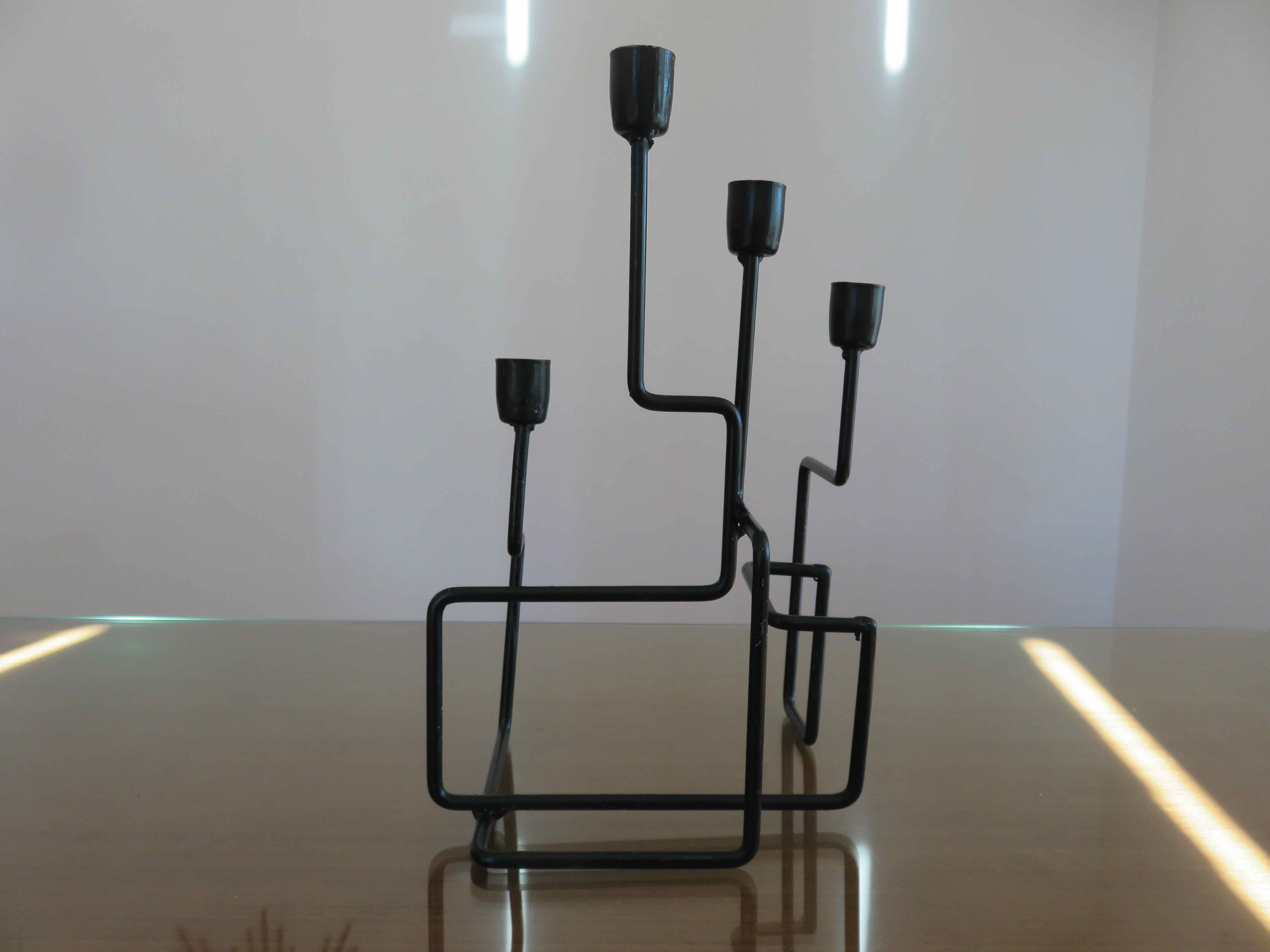 Modernist candle holder in black lacquered metal 1990