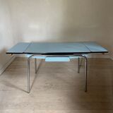 Blue formica table and its 4 chairs