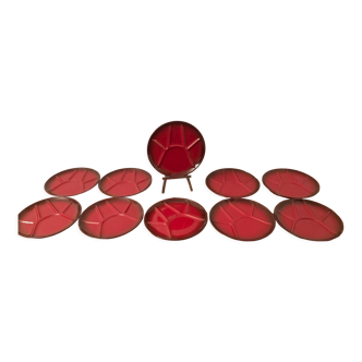 Series of 10 plates in red glazed ceramic 70s