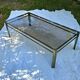 Table basse Broncz laiton verre fumé