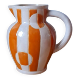 Old enamelled ceramic jug