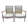 Paire de fauteuils de style Louis XVI en bois patiné