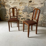 Set of 2 wooden chairs with studded leather.