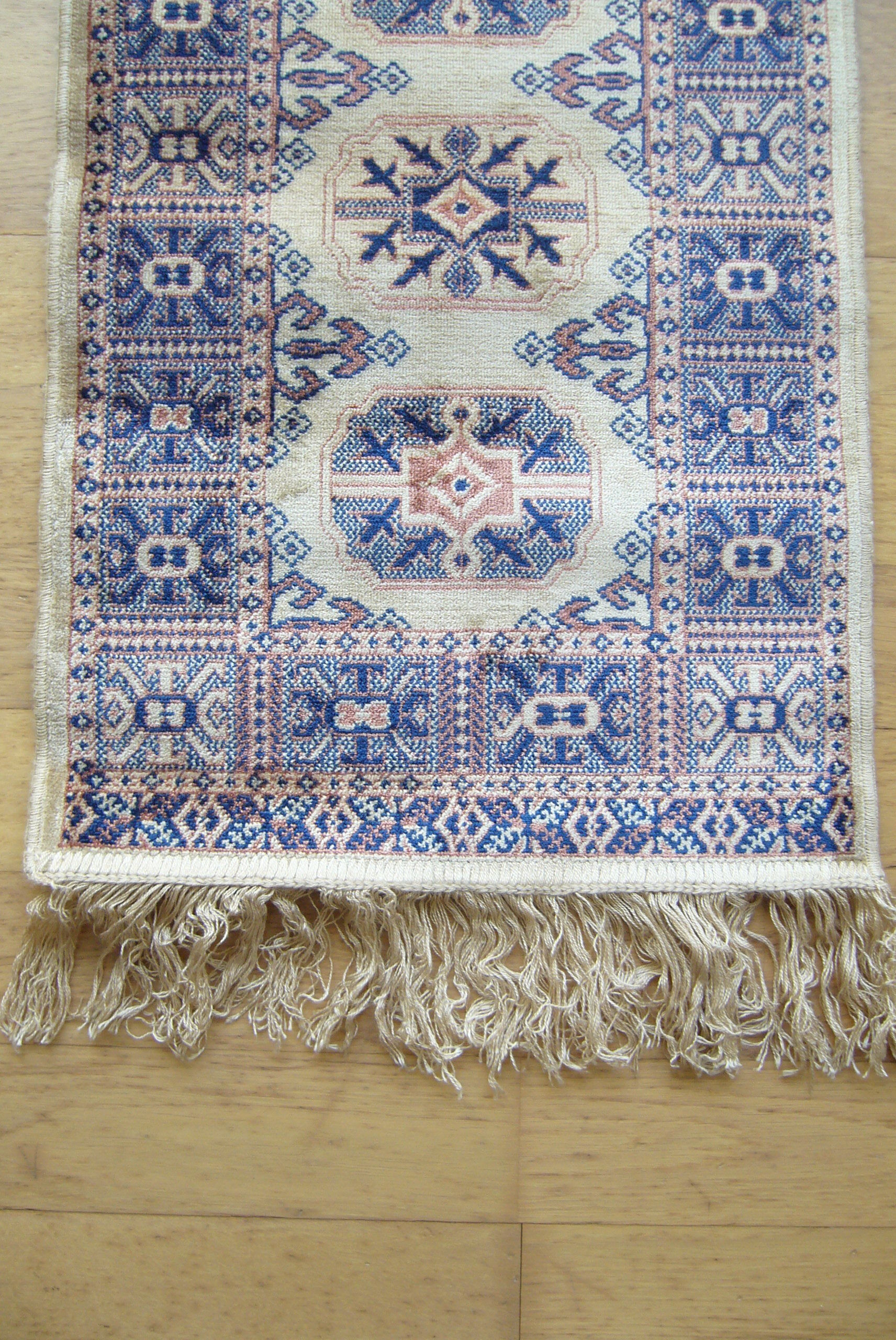 Three oriental rugs 35 x 70 cm