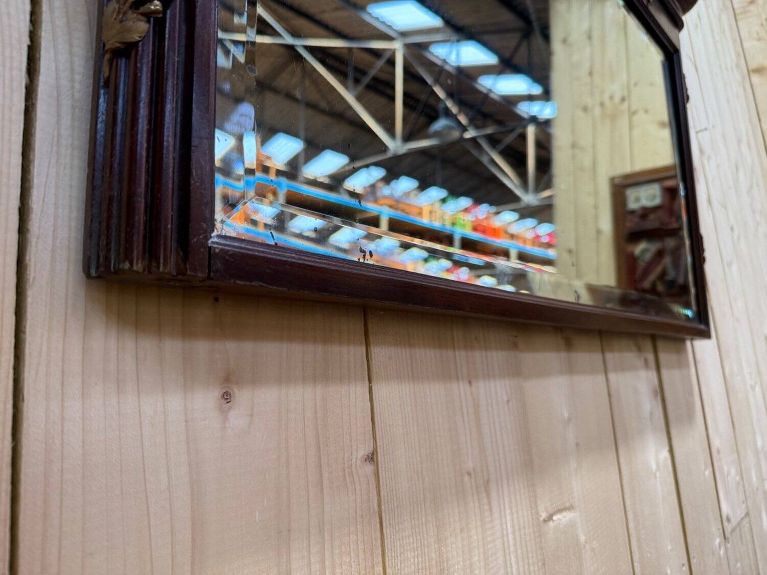 Louis XVI style mirror in mahogany and gold.