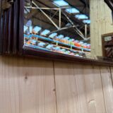 Louis XVI style mirror in mahogany and gold.