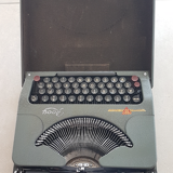 J M Rooy 50s travel writing machine
