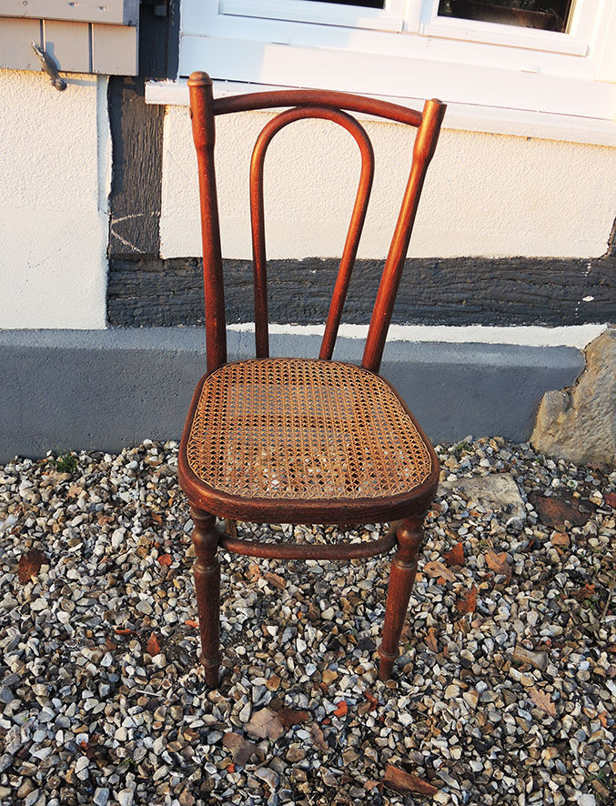 Old bistro chair in curved wood
