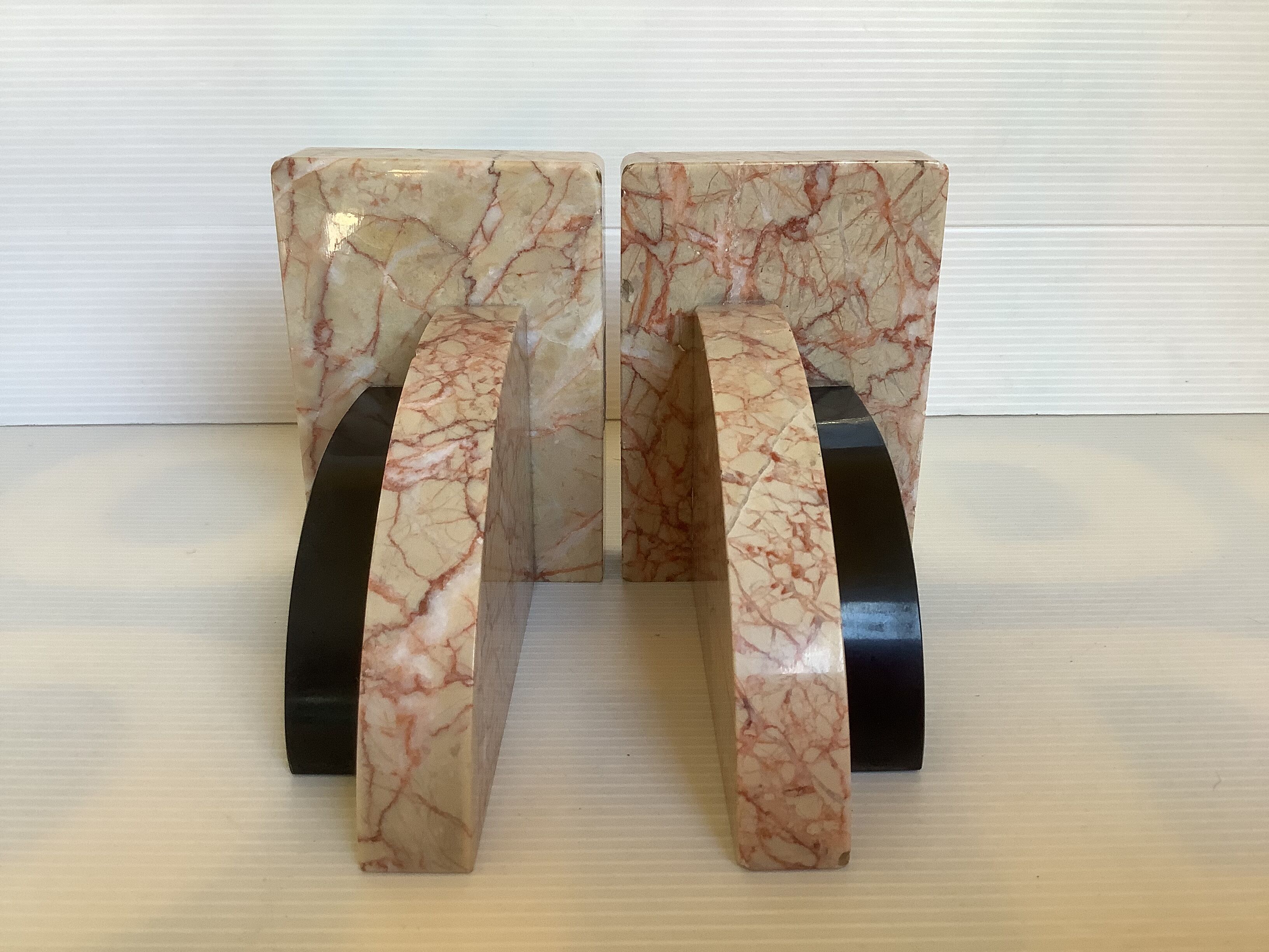 Pair of greenhouse books half moon marble art deco