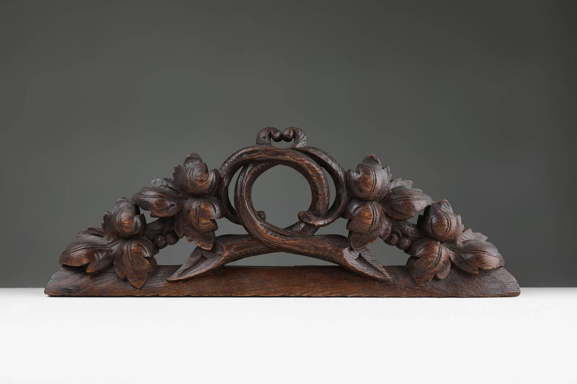 Oak pediment with hand-carved oak leaves around a wreath, France ca. 1850