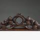 Oak pediment with hand-carved oak leaves around a wreath, France ca. 1850