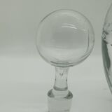 Engraved round decanter and its bubble top