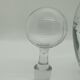 Engraved round decanter and its bubble top
