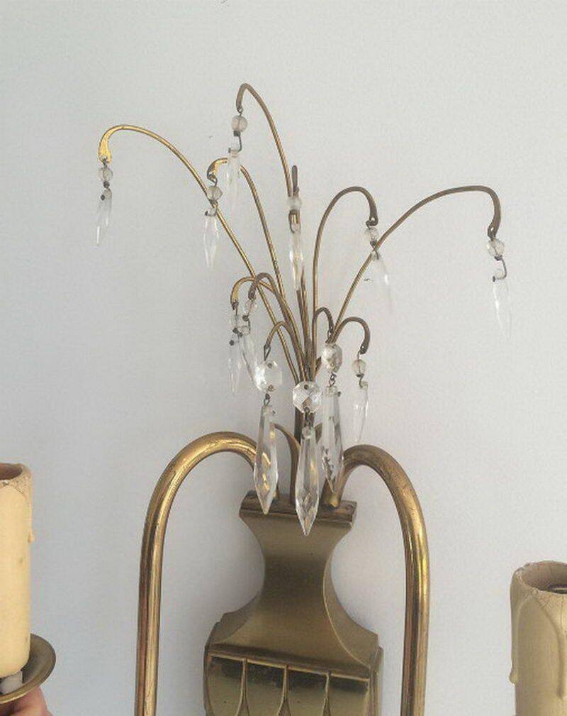 Pair of brass and crystal wall sconces