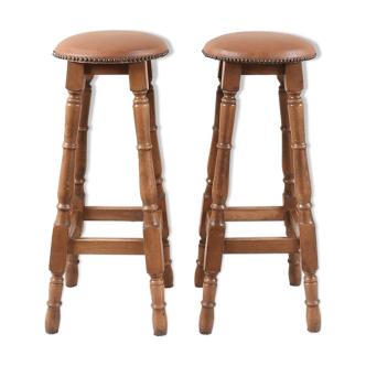 Antique bar stools, brown leather and wood
