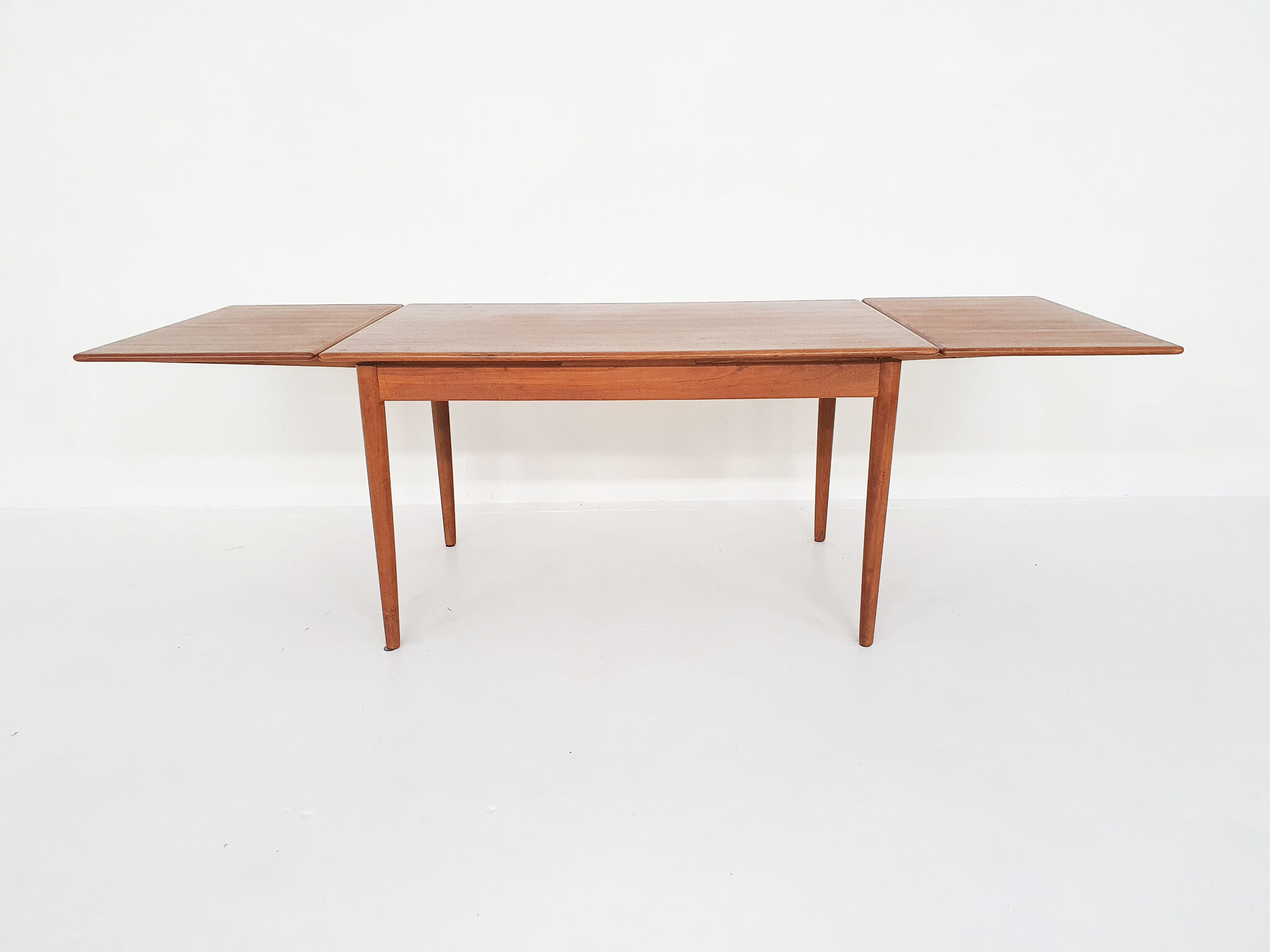 Scandinavian modern teak extendable dining table, 1950's
