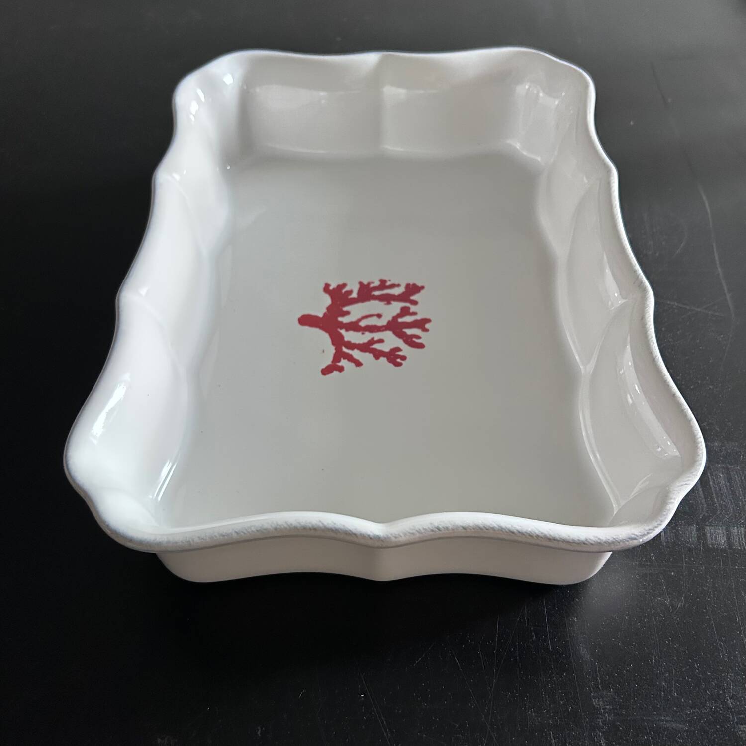 Provençal dish with coral decoration