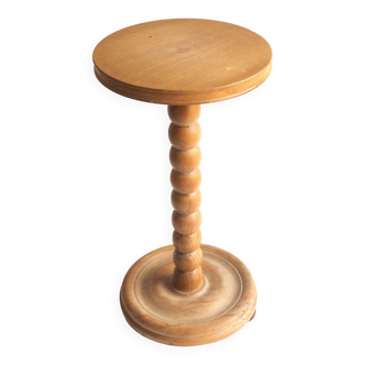 Beaded wood pedestal table