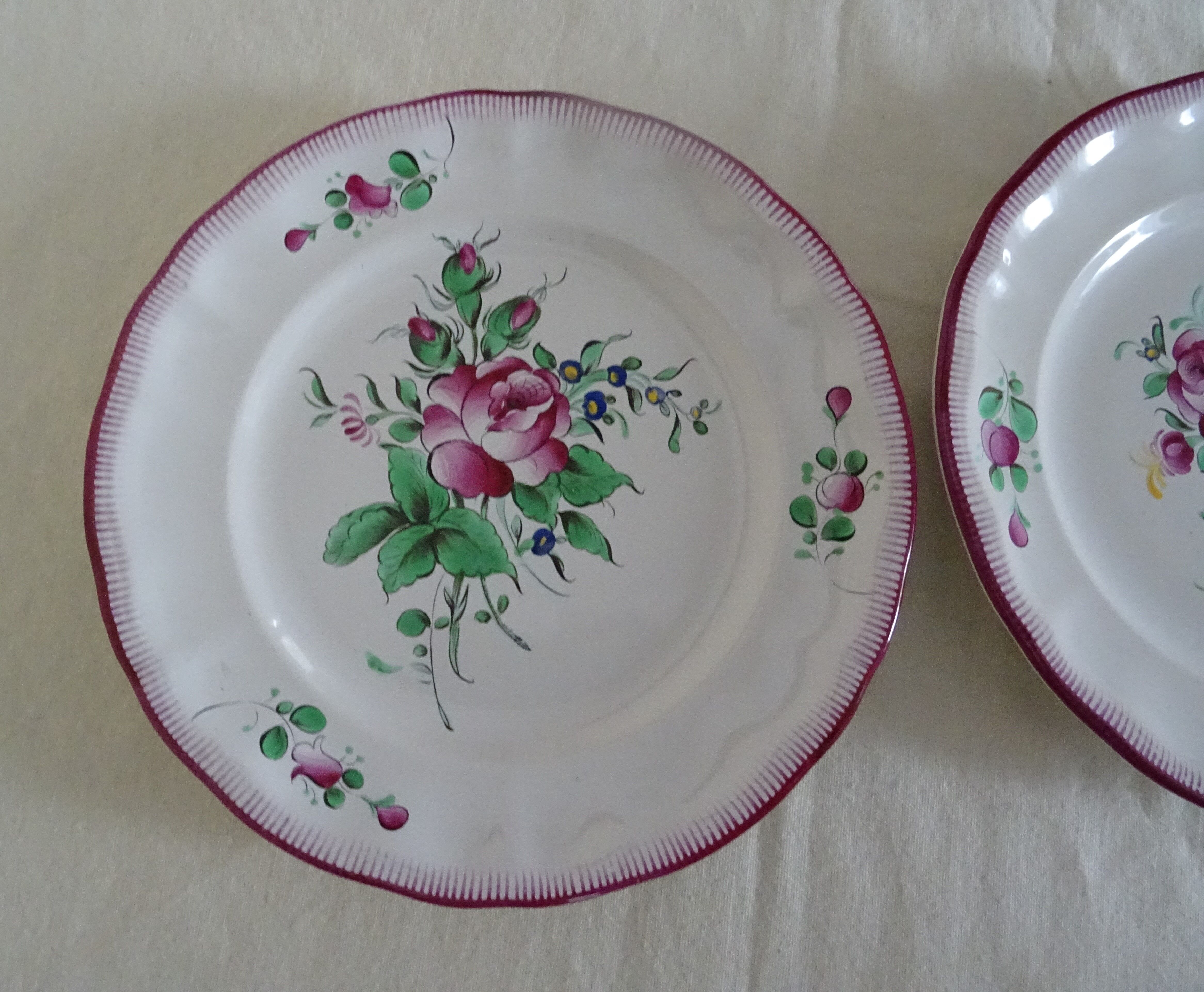 2 flat plates red flower faience Saint Clément