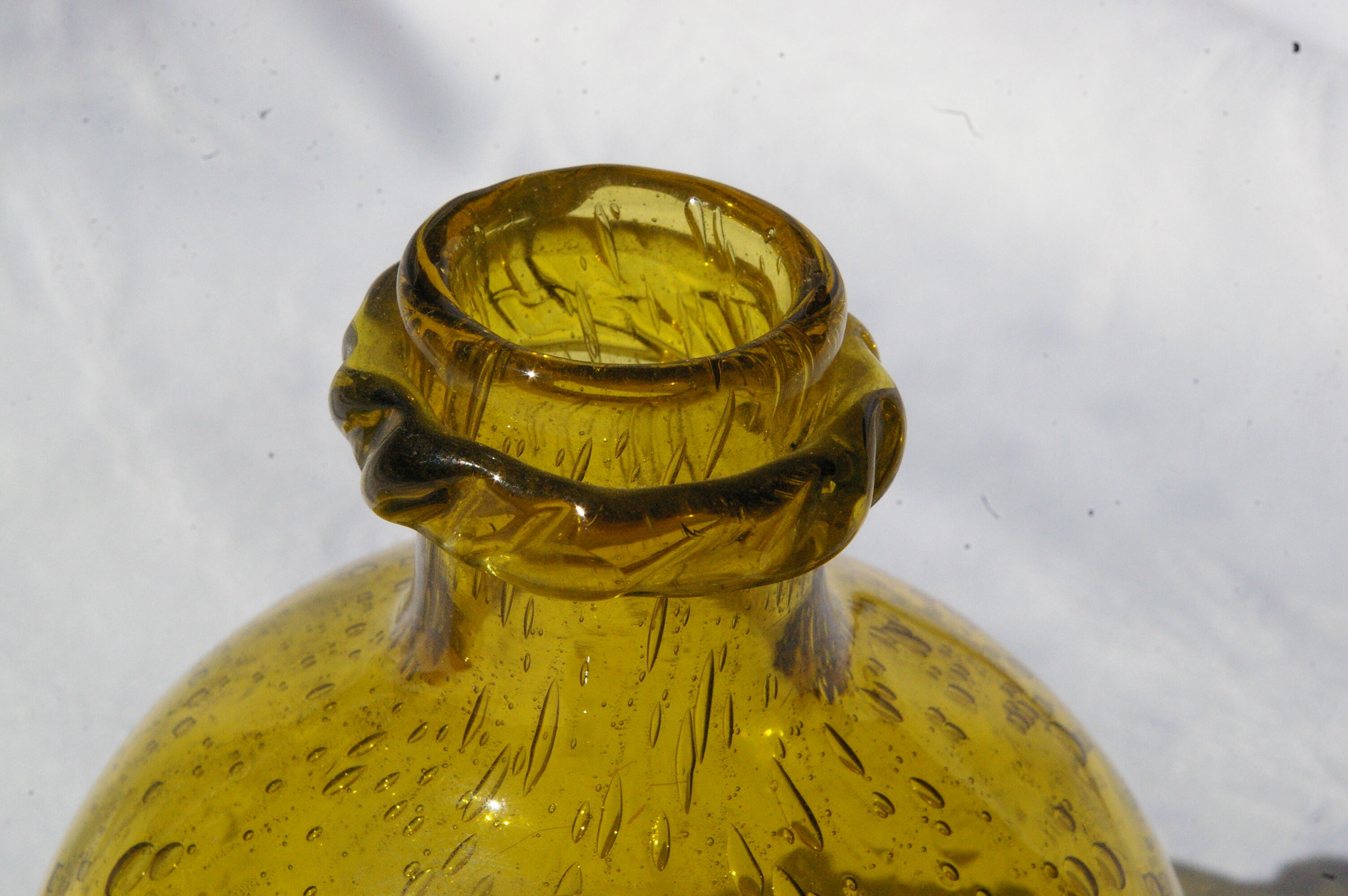 Bottle in bubbled glass of biot