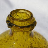 Bottle in bubbled glass of biot